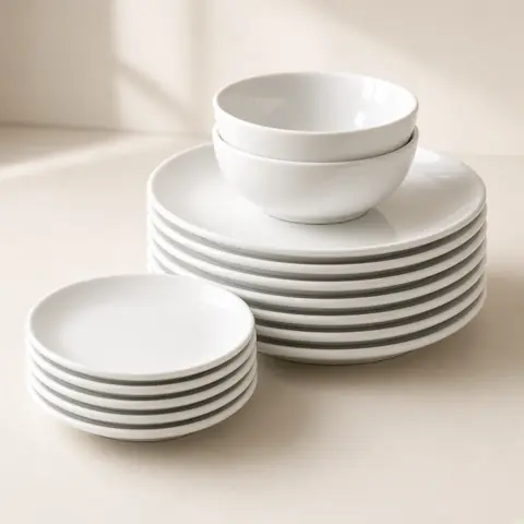 Illustrative photo for Amazon Basics 18-Piece White Porcelain Dinnerware Set, Service for 6